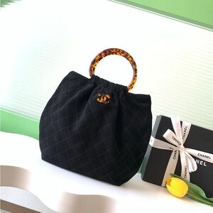 CHANEL Black Quilted Tote with Tortoise Ring Handle